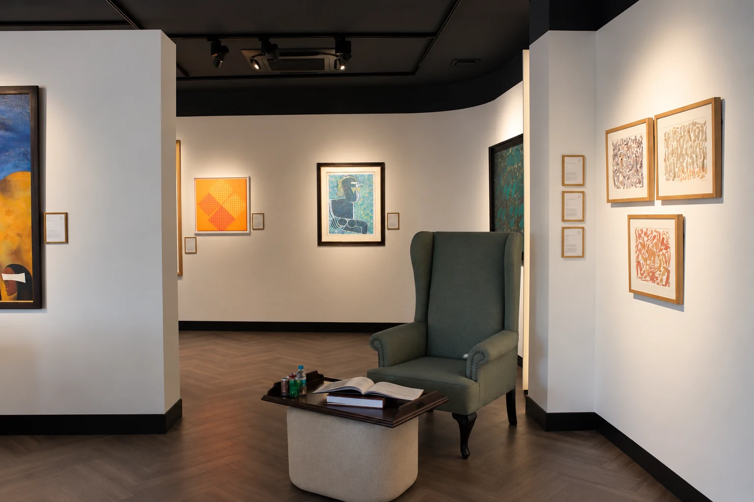 The gallery reading nook and surrounding artworks